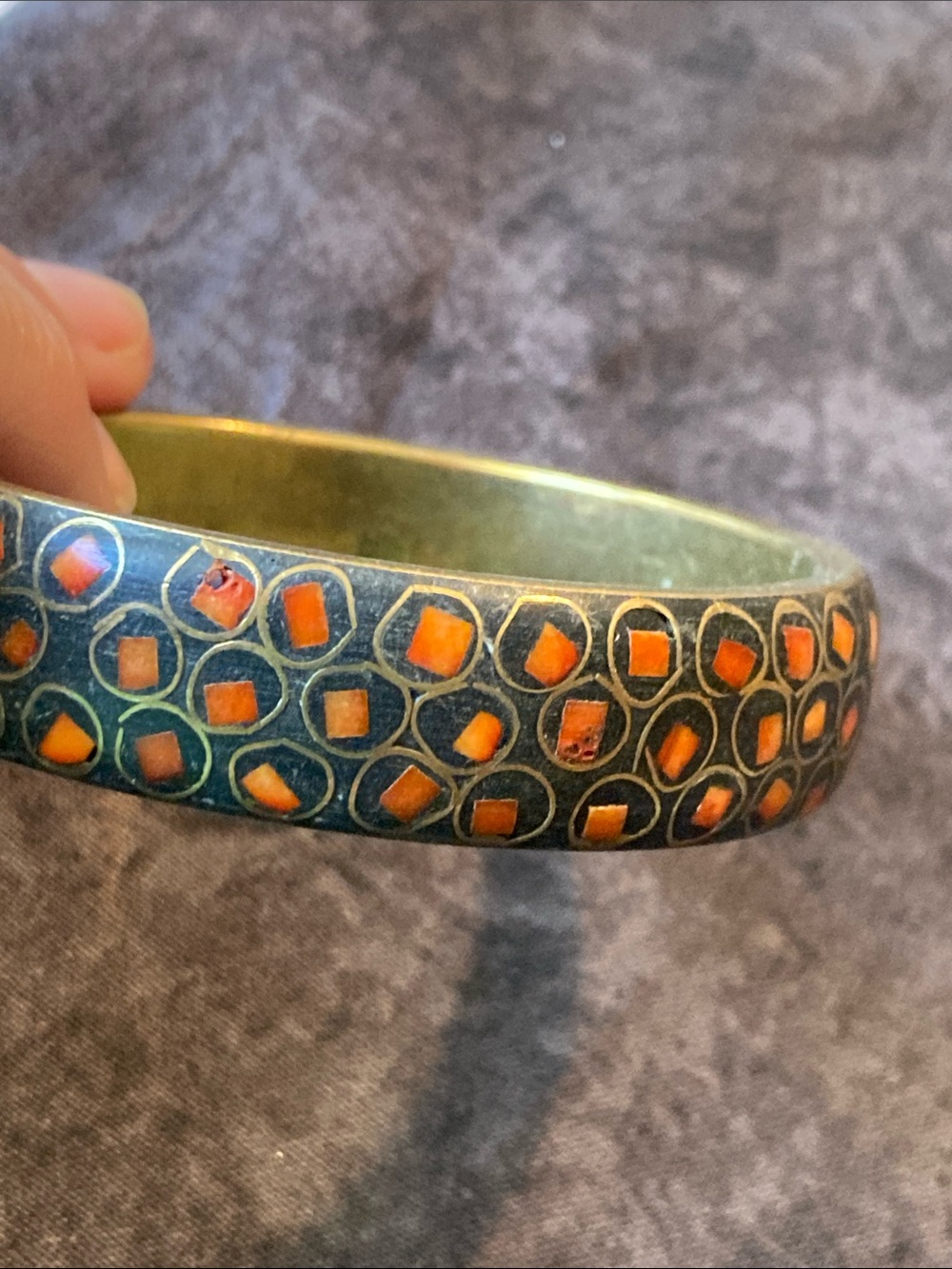Heavy brass colored bangle with Sunset colored inlay